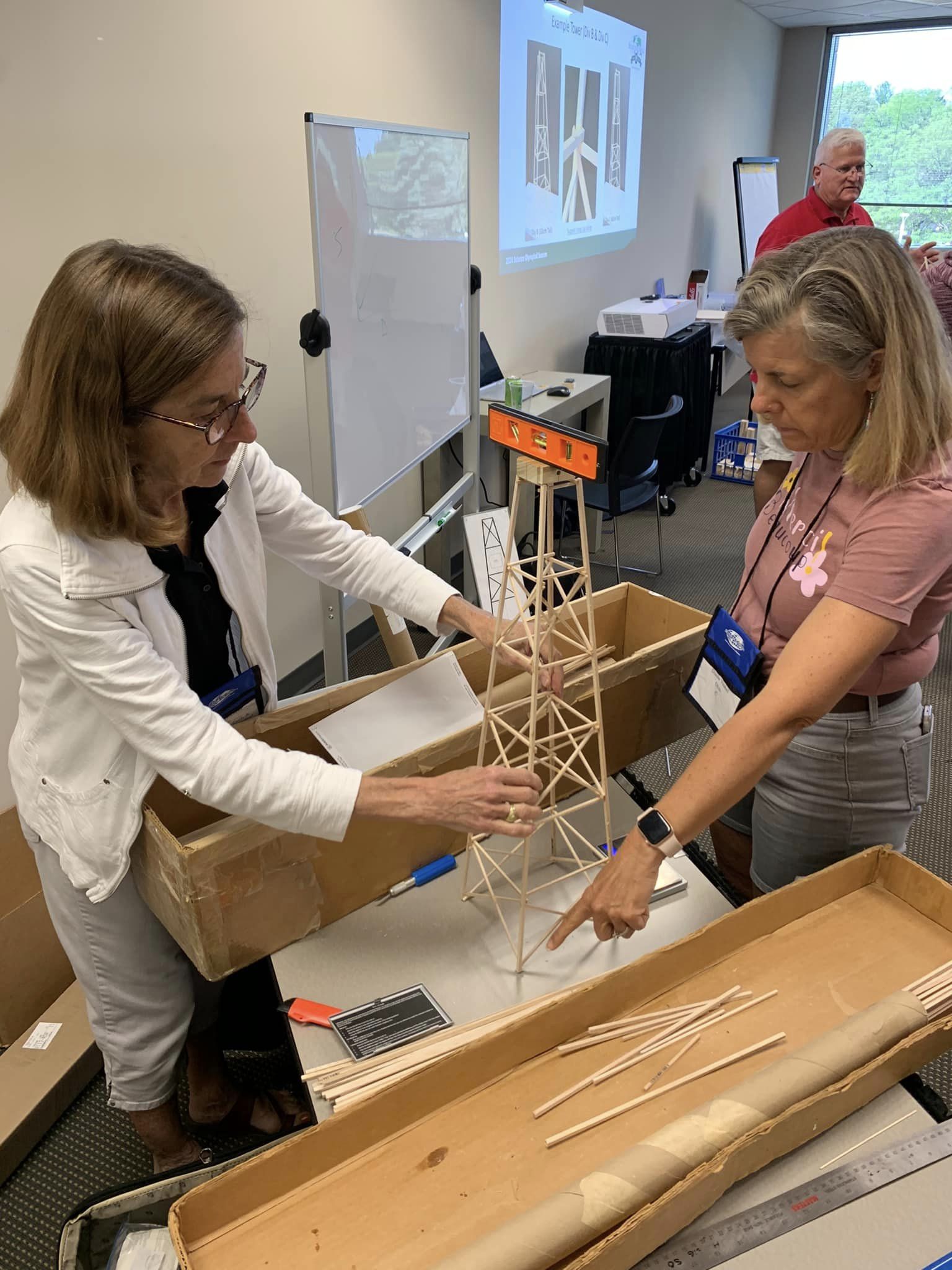 Educators learning about Tower at the Event Build Clinic!